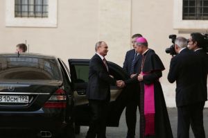 Archbishop Georg Gaenswein greets Russian president Vladimir Putin at the Vatican, June 10, 2015. (--Bohumil Petrik/CNA)